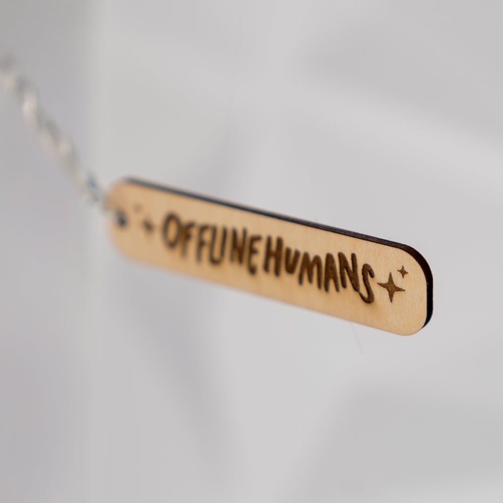 Offline Humans Wooden Charm 1