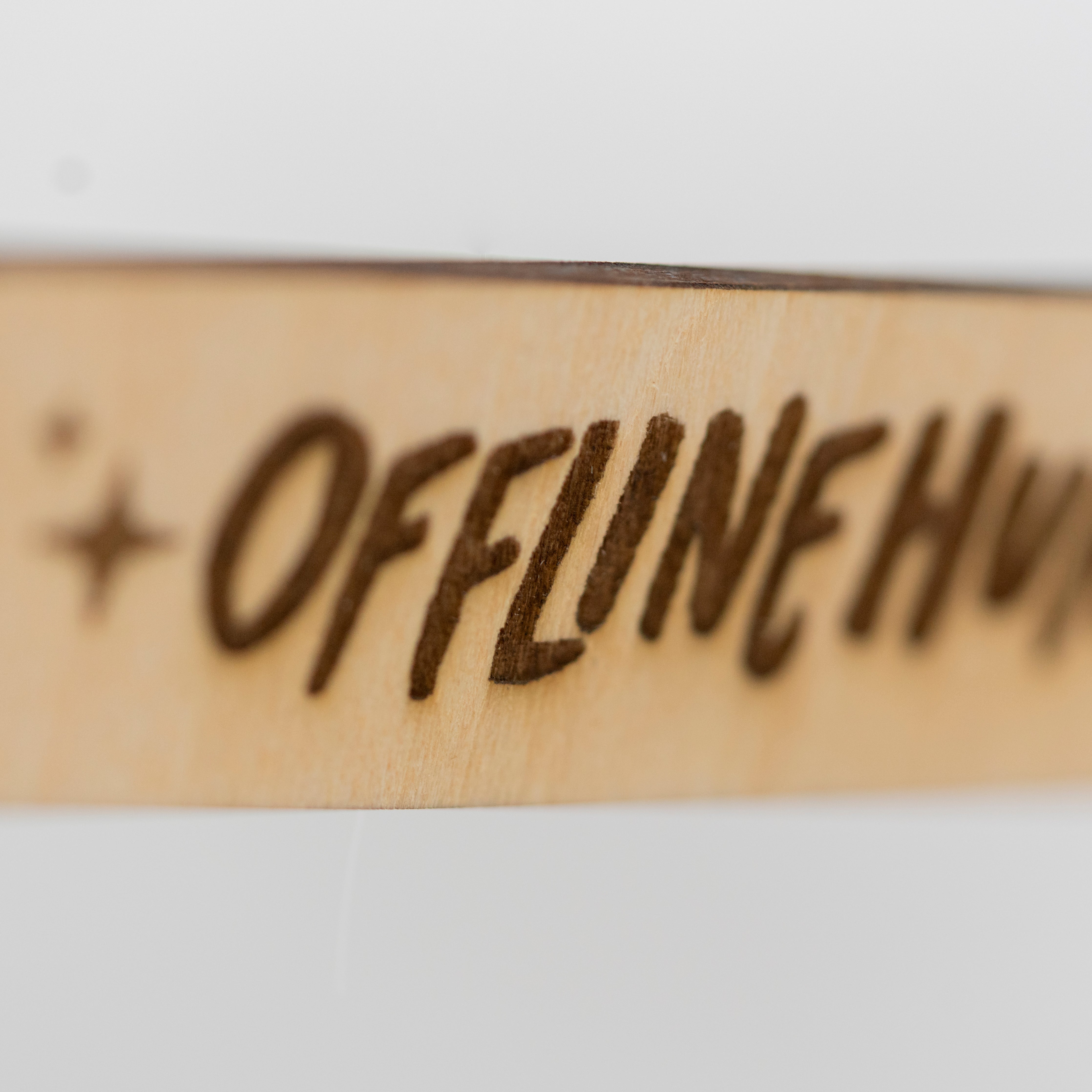 Offline Humans Wooden Charm 1