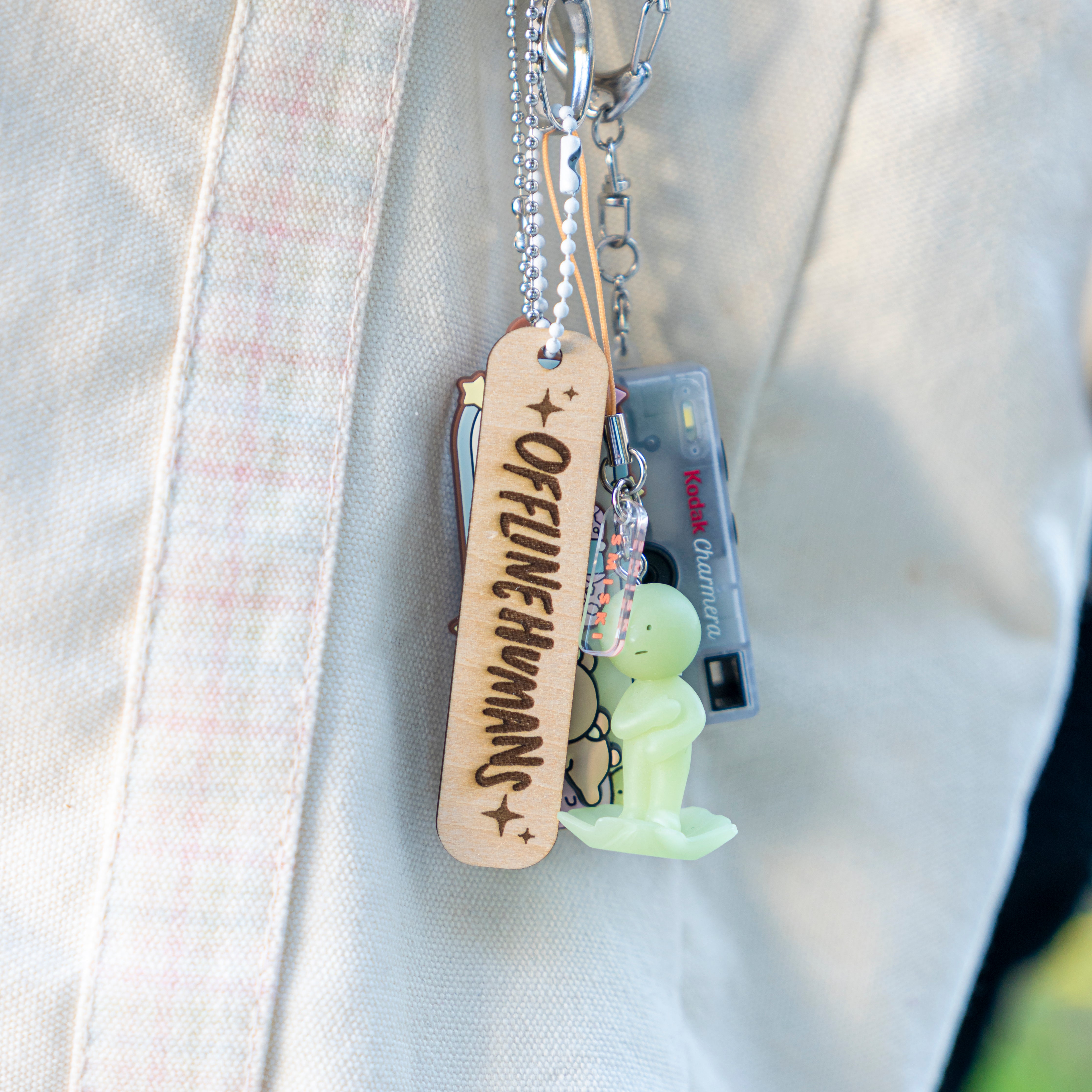 Offline Humans Wooden Charm 1